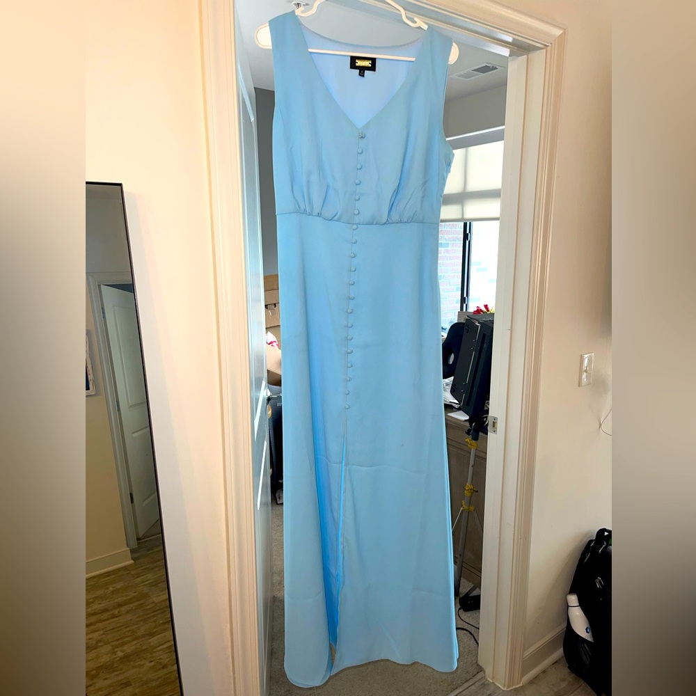 Maxi baby blue dress with buttons down front (does not open dress). Zip closure.